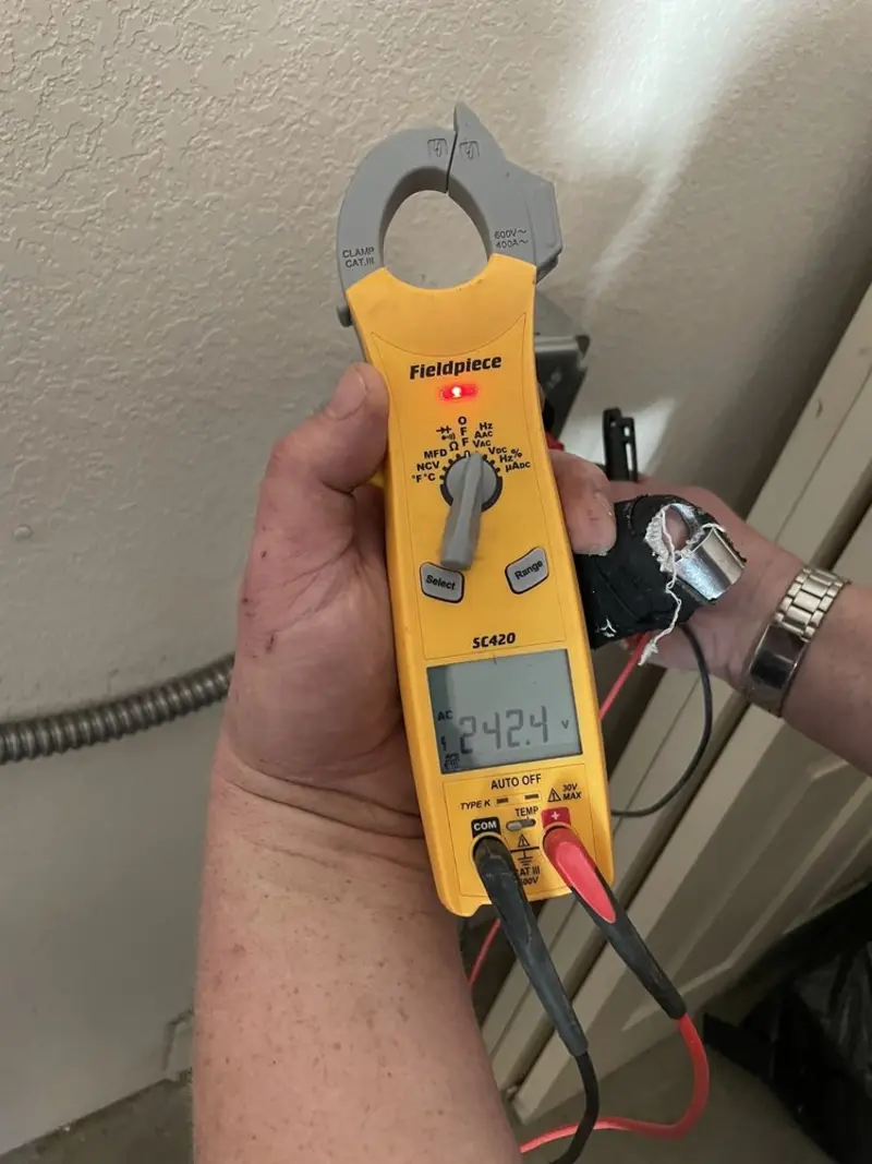 Voltage testing with clamp meter during Recessed Lighting Installation in Amarillo